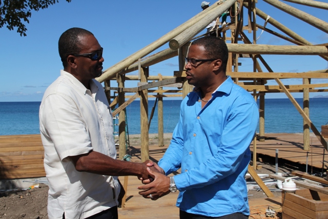 Deputy Premier of Nevis and Minister of Tourism Hon. Mark Brantley with General Manager of the Paradise Beach Nevis Ltd. Laughton Grant, in front of ongoing construction of the Beach Bar at Paradise Beach Nevis Ltd at Colquhoun Estate on March 04, 2014